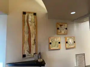 Commercial interior with custom abstract artwork and dental-themed wall art